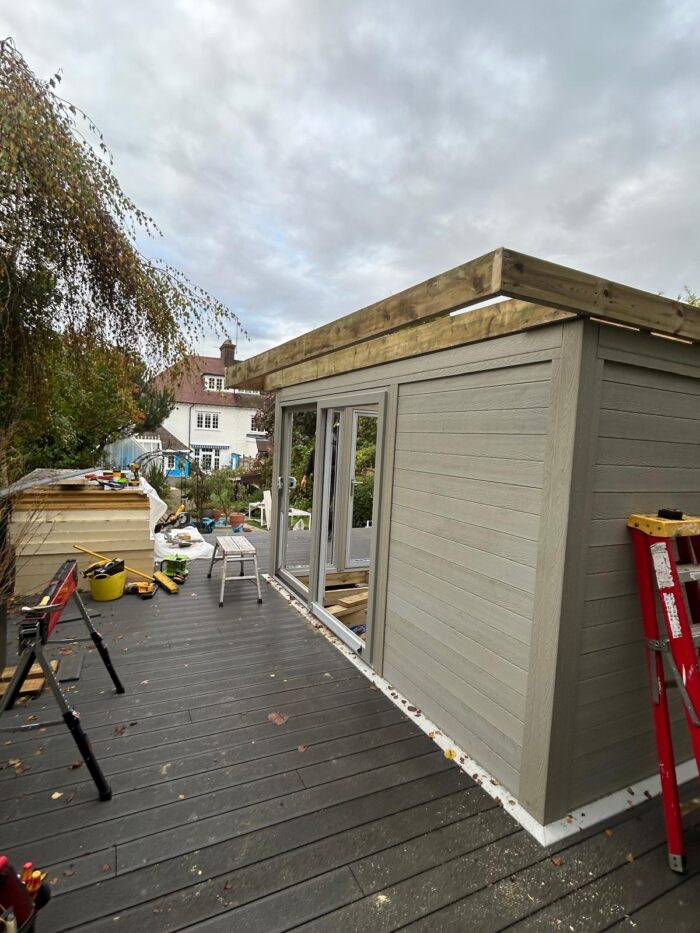garden room over a manhole cover